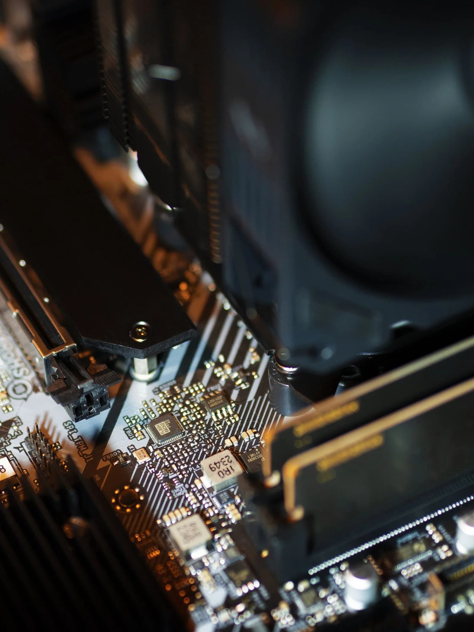 Computer motherboard showing processor cooling and memory areas